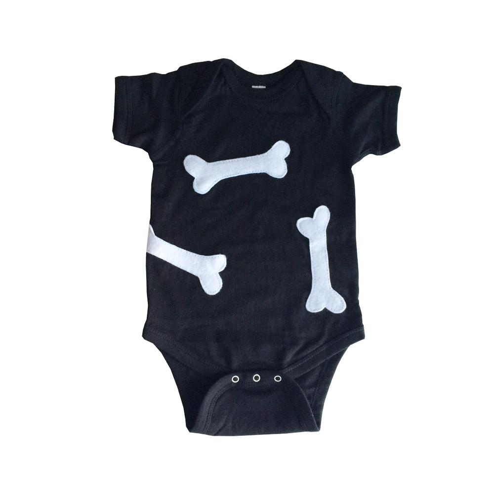 Adorable baby onesie with felt dog bone cutouts - handmade with love in Paradise, perfect for little dog lovers