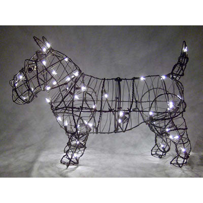 Illuminated Topiary Scottie sculpture wrapped with clear lights for festive garden decor